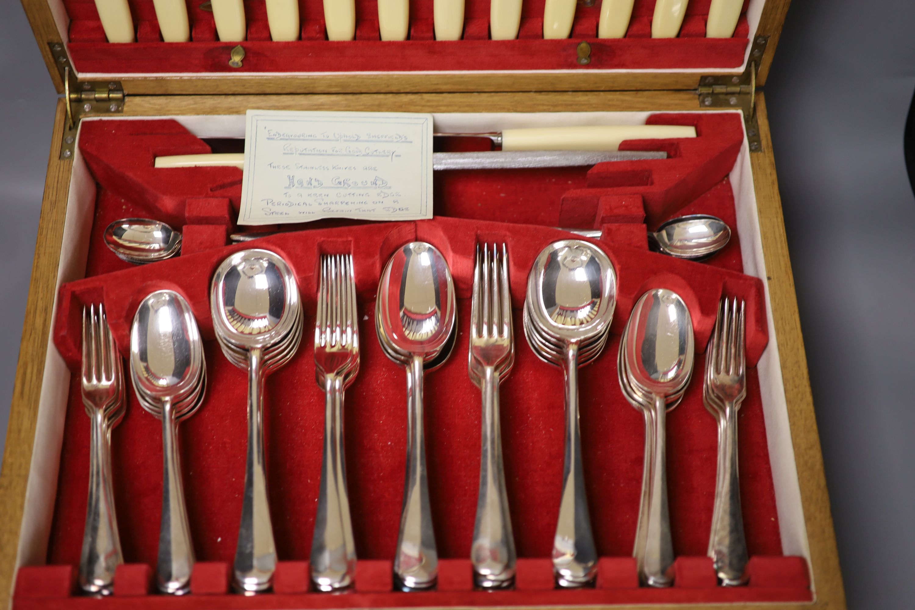 A canteen of silver plated cutlery (one piece missing)